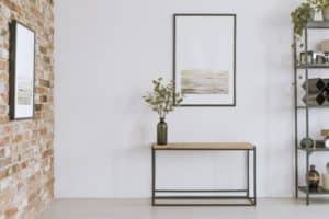 Console table with glass vase